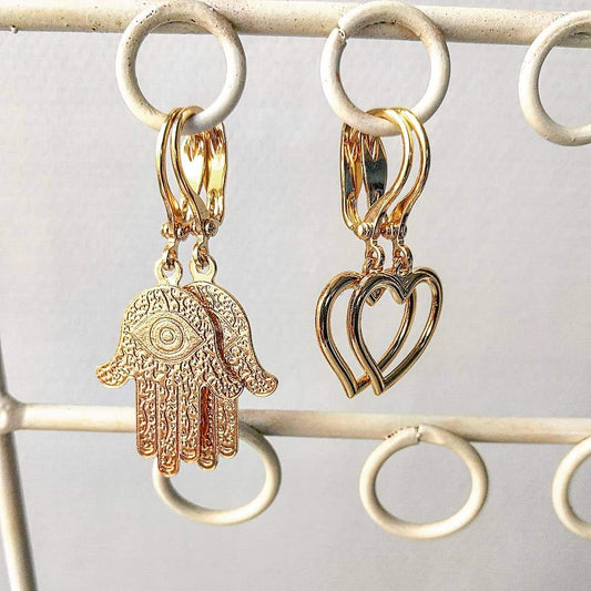 hamsa hand oorbellen - hangende oorbellen van goud - duurzame oorbellen en unieke sieraden shop je online bij lux & luz