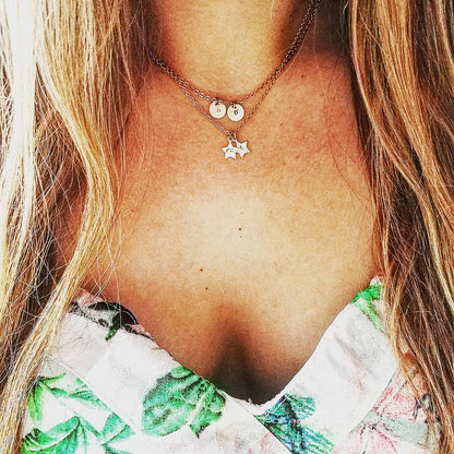 Dames sieraden capsule wardrobe essentials goud met persoonlijke initialen