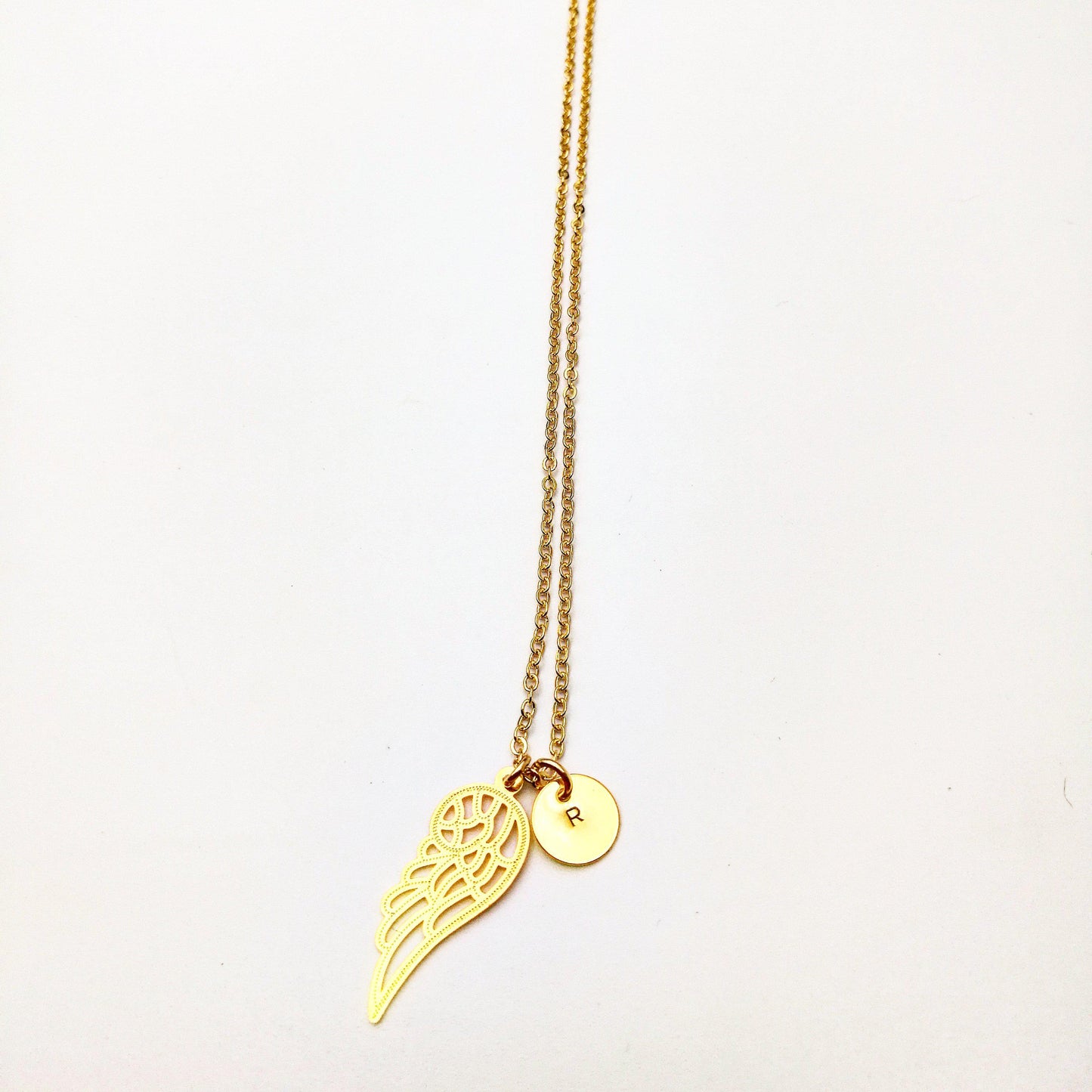 vleugel en initiaal ketting