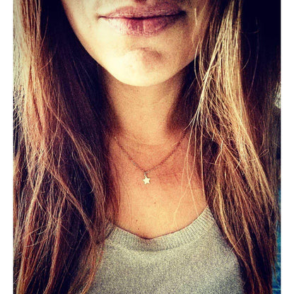 ster ketting - ketting met gouden sterretje - online bijzondere sieraden shoppen - lux & luz
